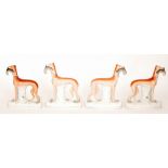 Two pairs of 19th Century Staffordshire models of sporting hounds,