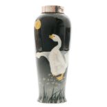 An early 20th Century Royal Doulton vase of slender form decorated with two pate sur pate geese