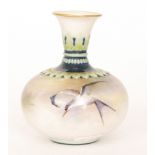 A late 19th Century Hadleys Worcester squat vase decorated with a hand painted seagull and