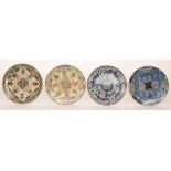 Four early 20th Century Royal Doulton cabinet plates each decorated with a Persian type pattern,