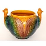 A large early 20th Century Bretby shape 697 jardiniere formed as two birds with bright coloured
