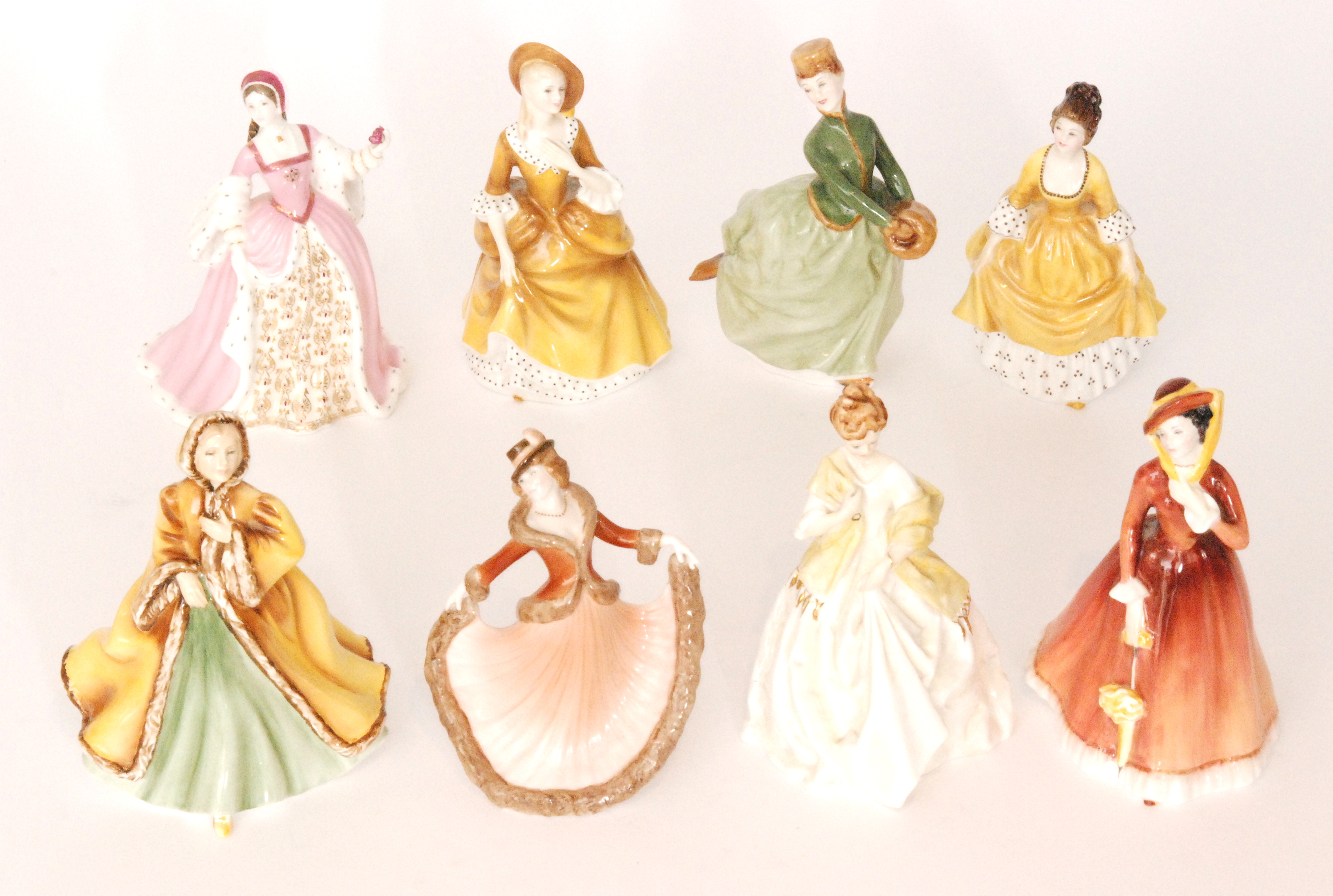 Five assorted Royal Doulton lady figurines comprising Coralie HN2307, Sandra HN2275, Julia HN2705,