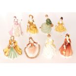Five assorted Royal Doulton lady figurines comprising Coralie HN2307, Sandra HN2275, Julia HN2705,