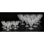 A suite of John Walsh Walsh crystal glass comprising ten champagne and eight cordial glasses,