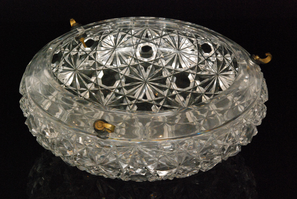 A large early 20th Century John Walsh Walsh clear cut crystal plaffonier of compressed ovoid form