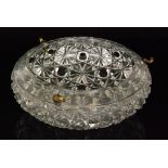 A large early 20th Century John Walsh Walsh clear cut crystal plaffonier of compressed ovoid form