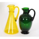 A large early 20th Century John Walsh Walsh glass jug of conical form in yellow,