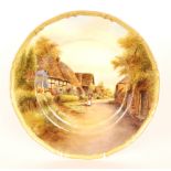 A Royal Worcester cabinet plate decorated by Rushton with a hand tinted scene entitled Little