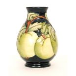 A Moorcroft Pottery baluster vase decorated in the Apples pattern, impressed marks, height 14.