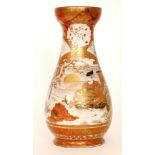 A large late 19th Century Japanese vase decorated with two rabbits amidst foliage and to the