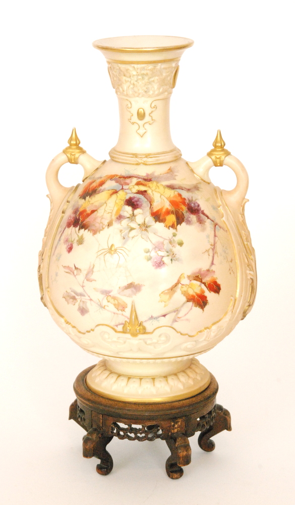 A large late 19th Century Royal Worcester twin handled shape 1553 blush ivory vase decorated with