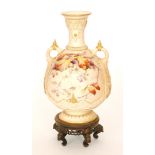 A large late 19th Century Royal Worcester twin handled shape 1553 blush ivory vase decorated with