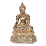 A Ming Dynasty Thai gilt bronze figure of buddha,