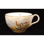 A Royal Worcester teacup panel decorated by James Stinton with two hand painted grouse in a