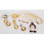 A small parcel lot of costume jewellery to include two pairs of gilt metal Chanel clip earrings,