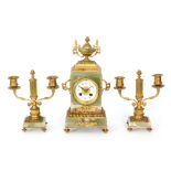 An early 20th Century French gilt green onyx clock garniture set with eight day striking movement,