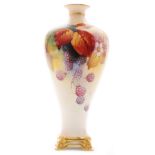 A Royal Worcester shape F106 vase of high shouldered form raised to an affixed stand,