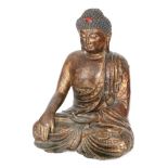 A Chinese lacquered, gilded and painted bronze figure of Buddha Shakyamuni,