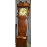A 19th Century oak and mahogany crossbanded longcase clock with a thirty hour movement,