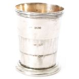 An Aspreys of London hallmarked silver retractable stirrup cup with three gilt washed drawers,