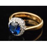 An early 20th Century hallmarked 22ct synthetic sapphire and diamond ring,