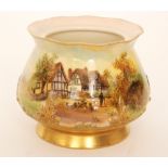 A Royal Worcester Hadleys shape 265 footed pot pourri vase (lacking cover) decorated with a scene