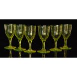 A set of six late 19th Century Uranium wine glasses,