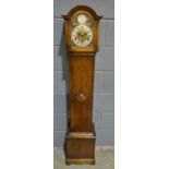 A 1930s oak Grandmother clock with eight day striking movement,