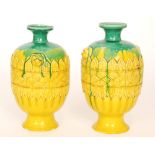 A pair of 19th Century Chinese pottery vases of shouldered ovoid form with collar neck,