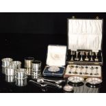 A small parcel lot of assorted hallmarked silver items to include four napkin rings,