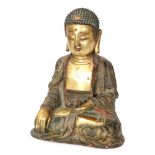 A Chinese Ming dynasty (1368-1644) gilt bronze figure of Buddha,