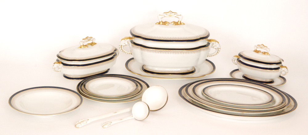 A late 19th Century Royal Worcester part dinner service comprising three graduated tureens and