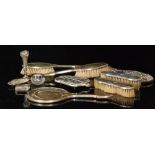 A parcel lot of assorted hallmarked silver items to include two hand mirrors, four brushes,