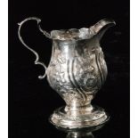 A George III hallmarked silver cream jug,