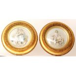 A pair of early 20th Century continental circular bisque plaques,