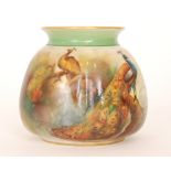 A Royal Worcester shape H158 cache pot decorated by Flexman with hand painted with two peacocks