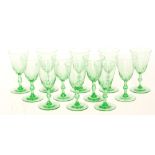 A set of twelve late 19th Century Uranium wine glasses,