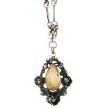 An early 20th Century German sterling silver mounted citrine pendant,