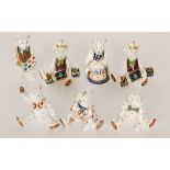 Seven assorted small Royal Crown Derby teddy bear paperweights to include two holding Christmas