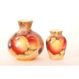 Two later 20th Century Dunheved vases both decorated in the style of Royal Worcester Fallen Fruit