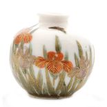 An early 20th Century miniature Japanese vase of ovoid form decorated with purple and orange iris,