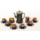 A 1920s Wiltshaw and Robinson Carlton Ware coffee set comprising a coffee pot, six cans and saucers,