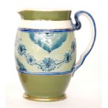 William Moorcroft - Macintyre & Co - An early 20th Century jug decorated with a tubelined garland