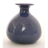Ruskin Pottery - A small souffle glaze vase of sqaut bulbous form with a small flared neck,