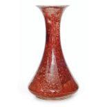 Ruskin Pottery - A high fired vase of low bellied form with a flared neck,