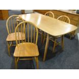 Ercol - Four blonde elm and beech 'Windsor' hoop back dining chairs, model 370,