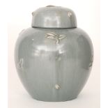 Clarice Cliff - Kang - A ginger jar and cover circa 1937 in the Chinese taste decorated with relief