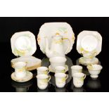 Shelley - A 1930s Art Deco coffee set decorated in pattern 12010 with yellow dandelion flowers and