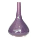 Ruskin Pottery - A souffle glaze mallet vase decorated in an all over mottled purple,