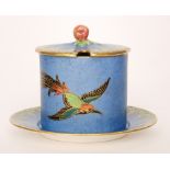 Crown Devon - A 1930s Art Deco drum shape preserve pot and stand decorated with a gilt and enamel